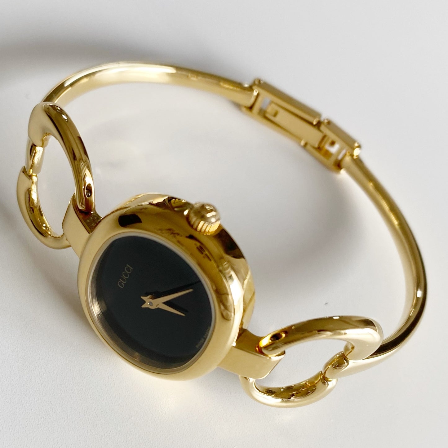 Gucci 1990s Black Dial Gold Plated Bangle Watch