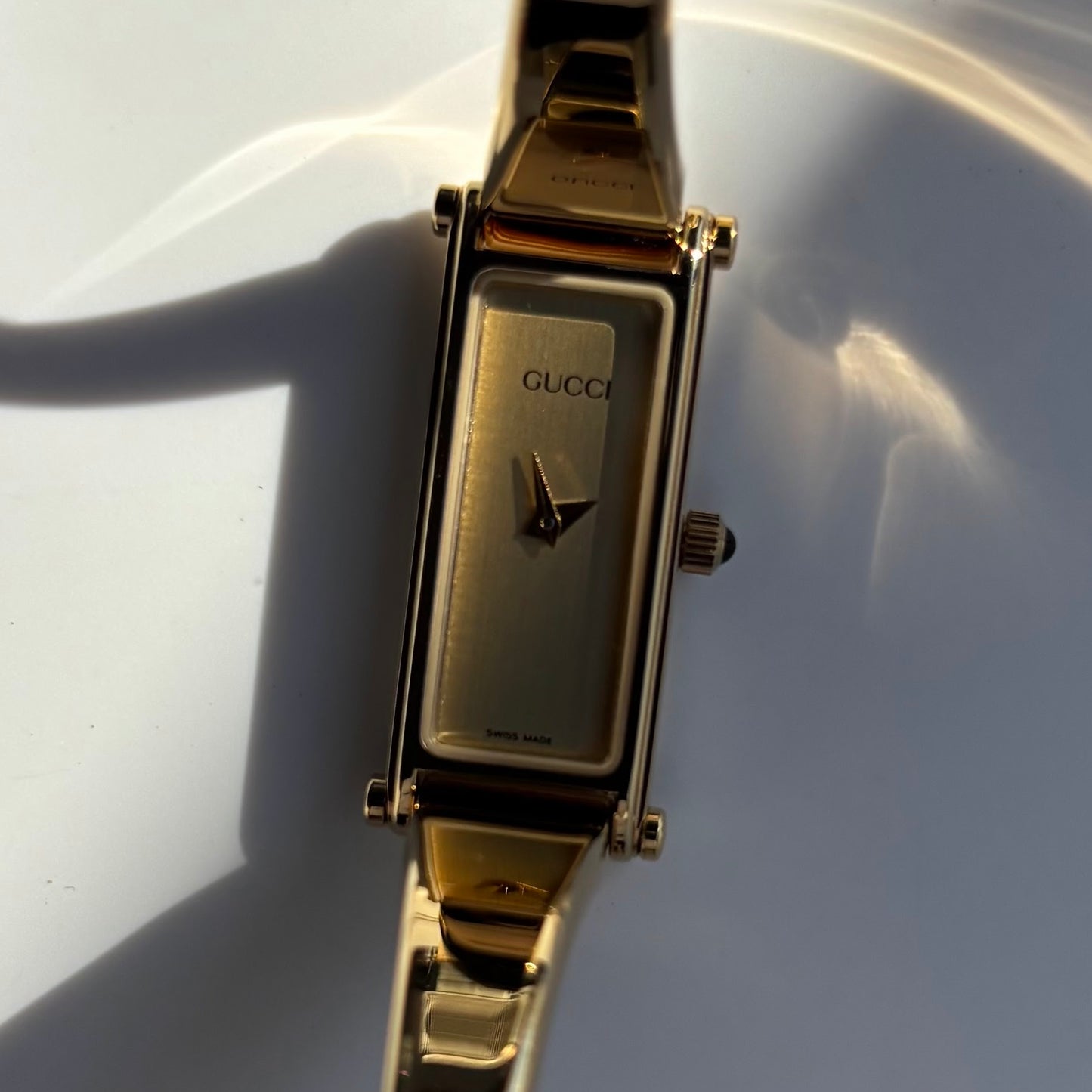 Gucci 1990s Rectangular Dial Gold Plated Bangle Watch