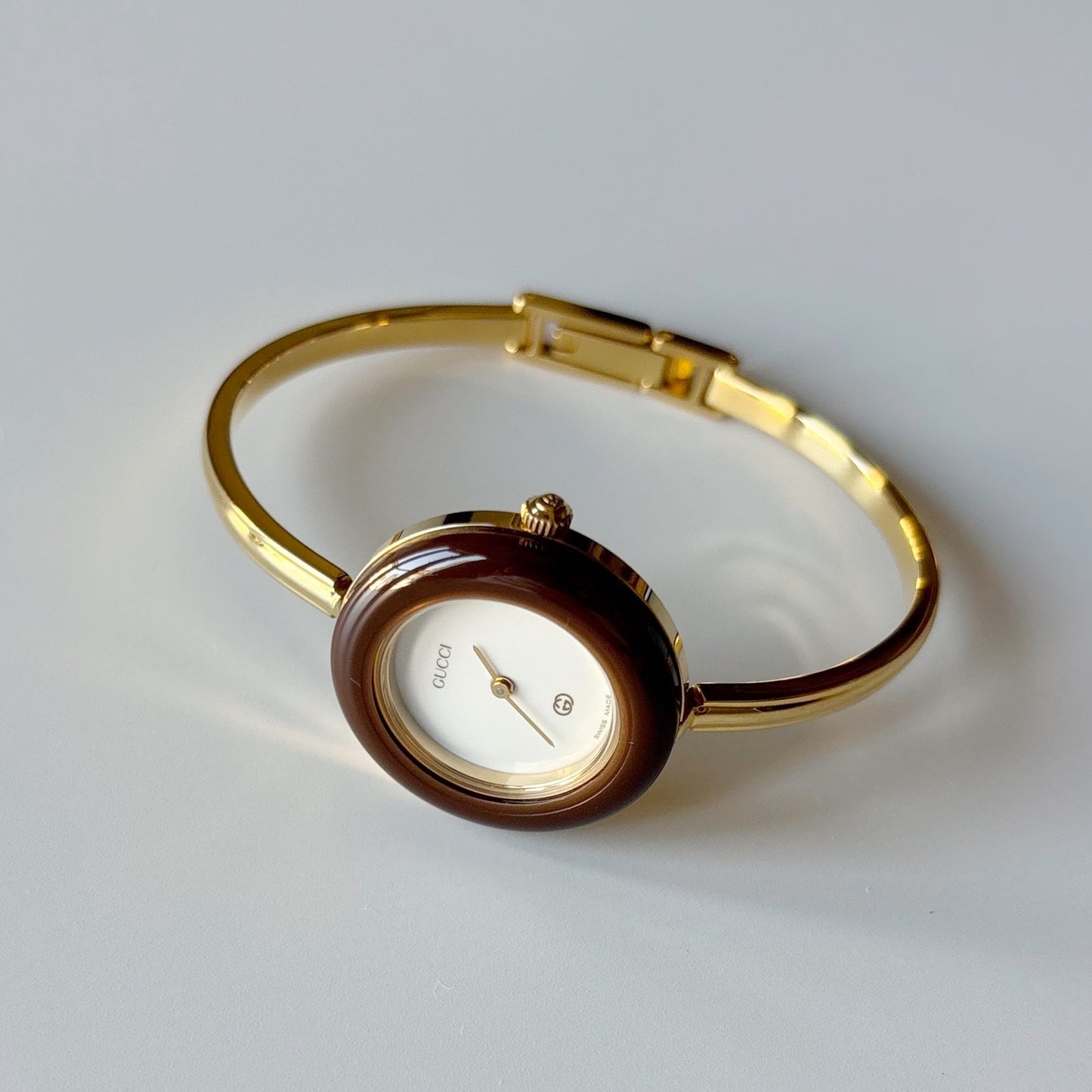 Gucci 1990s Interchangeable Bezel Gold Plated Bangle Watch with 12 bezels, case