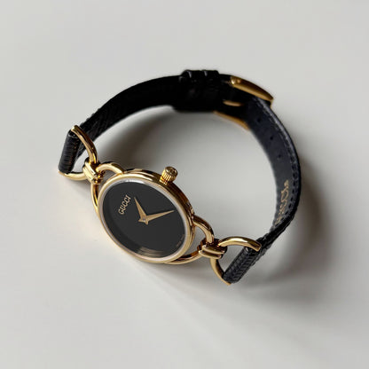 Gucci 1990s Black Dial Horsebit Gold Plated Watch