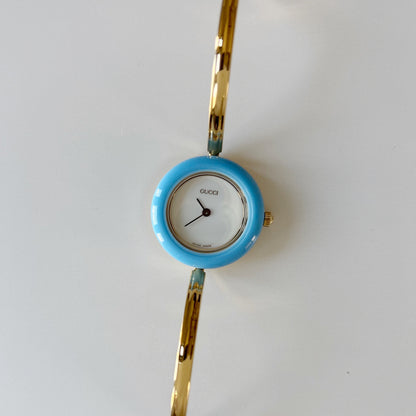 Gucci 1990s Interchangeable Bezel Gold Plated Bangle Watch with 12 bezels, case (Small)