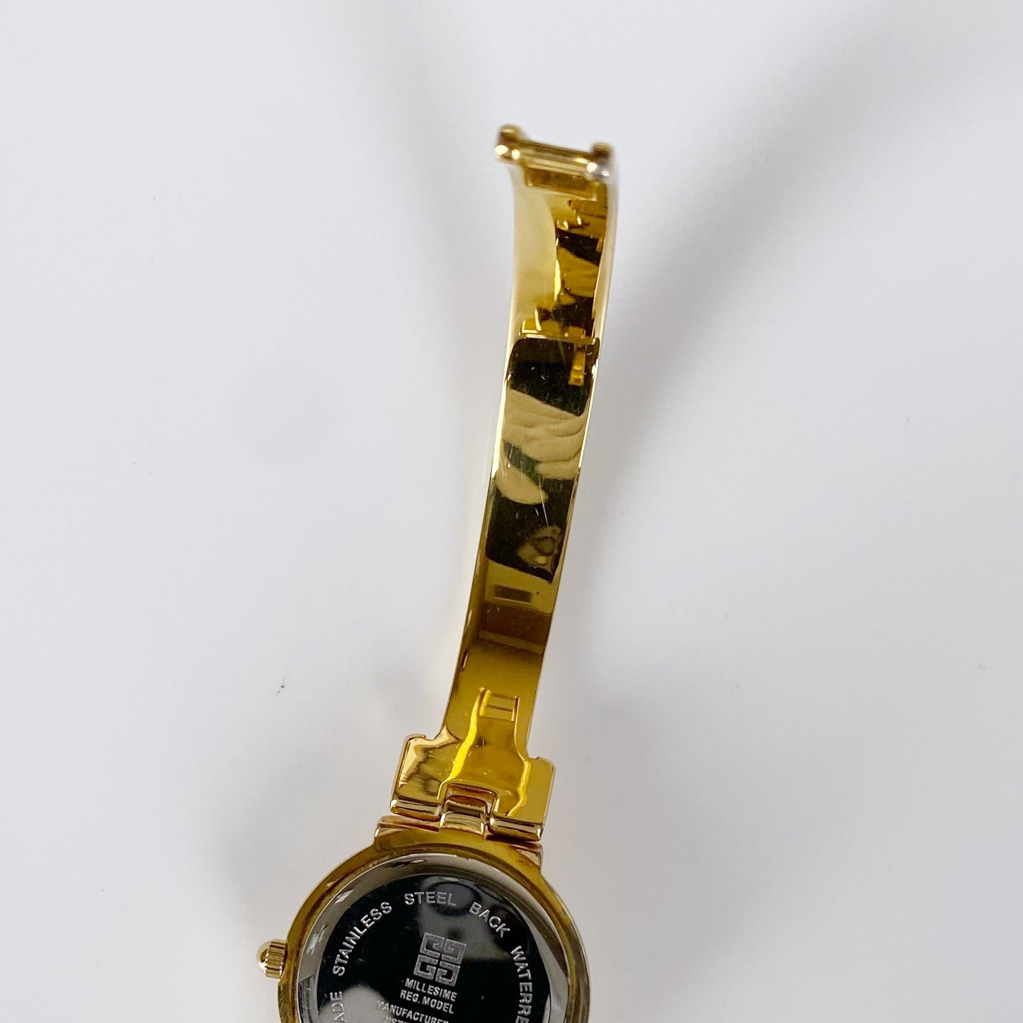 Givenchy 1990s Gold Plated Round Bangle Watch