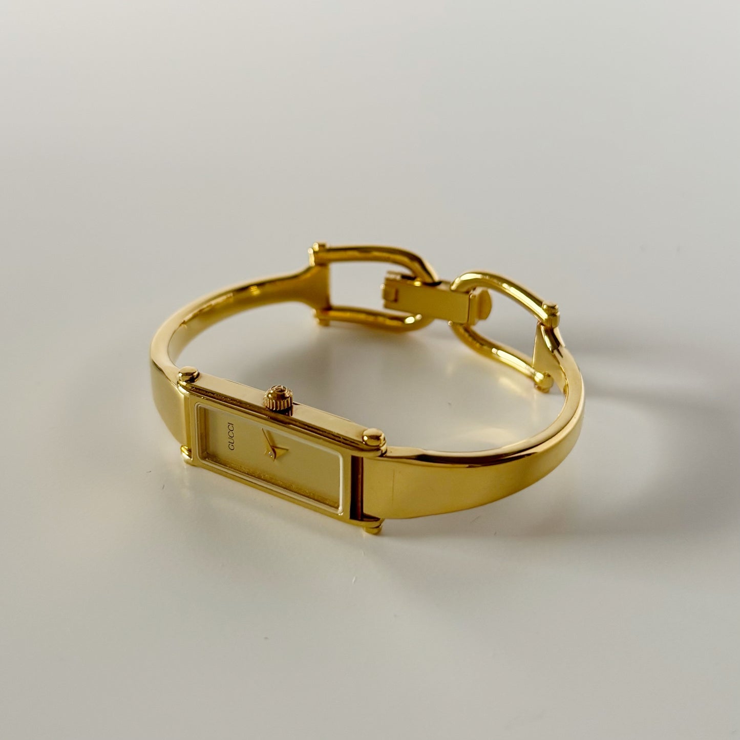 Gucci 1990s Gold Dial Rectangular Gold Plated Bangle Watch