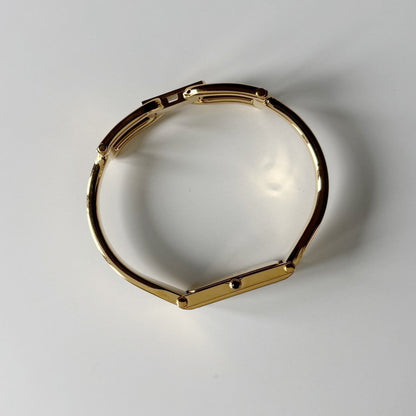 Gucci 1990s Seashell Dial Rectangular Gold-Plated Bangle Watch