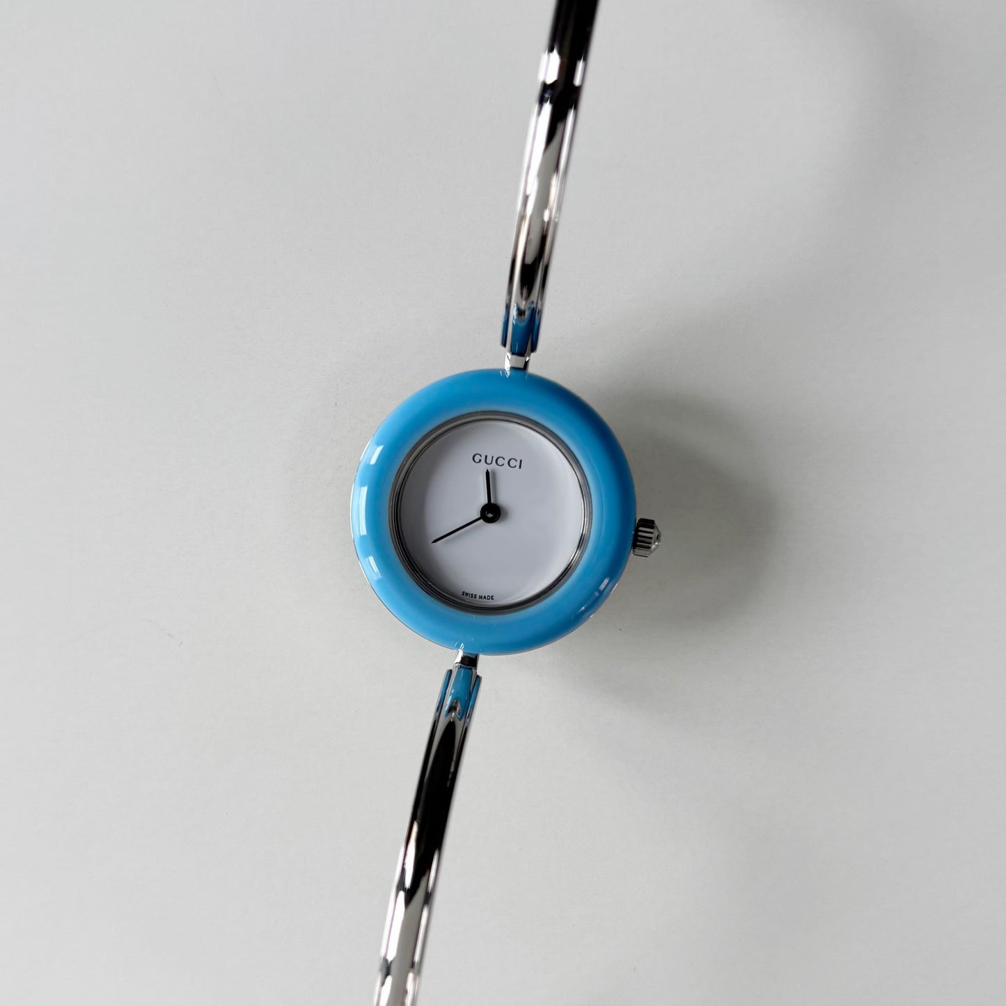 Gucci 1990s Interchangeable Bezel Silver Stainless steel Bangle Watch with 12 bezels, case