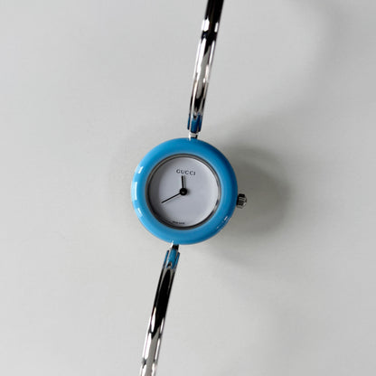 Gucci 1990s Interchangeable Bezel Silver Stainless steel Bangle Watch with 12 bezels, case