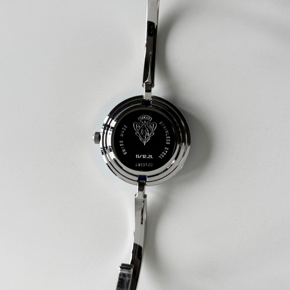 Gucci 1990s Interchangeable Bezel Stainless steel Bangle Watch with 12 bezels, case (Small)