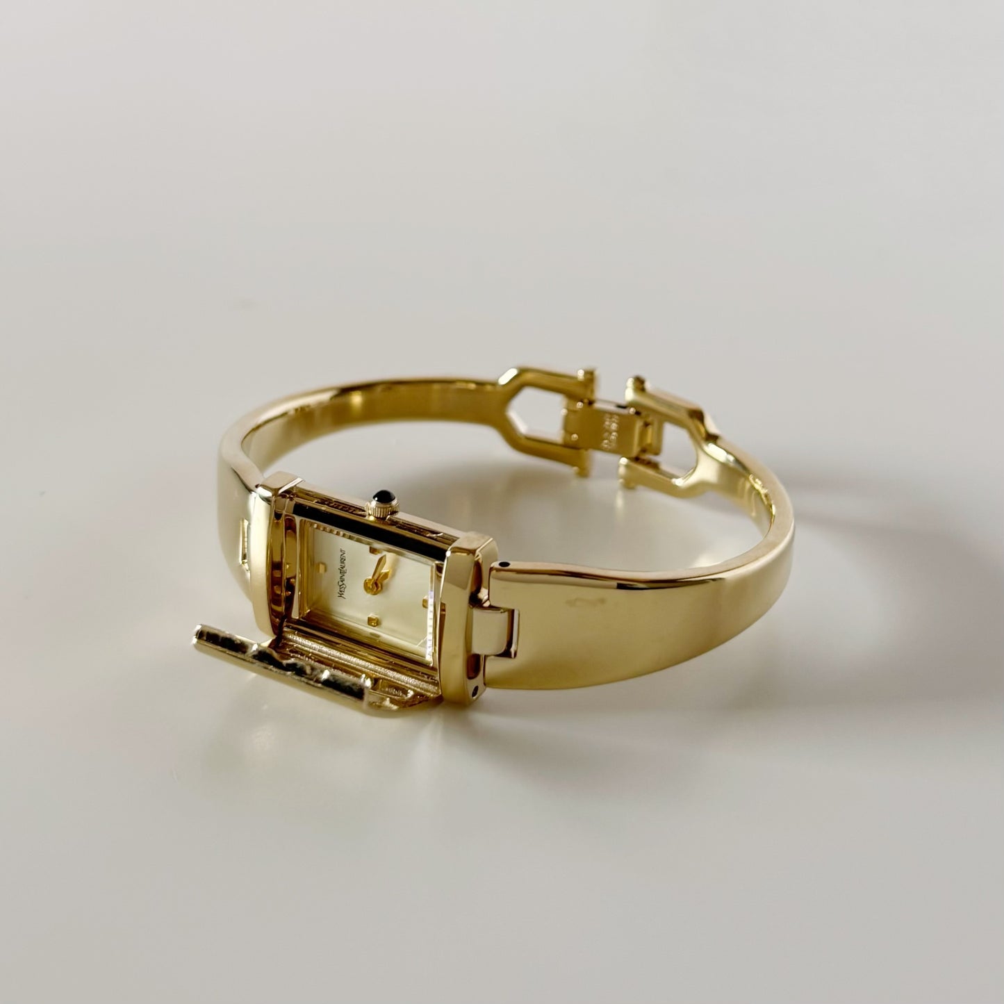 Yves Saint Laurent 1990s Peek-A-Boo Gold Plated Bangle Watch