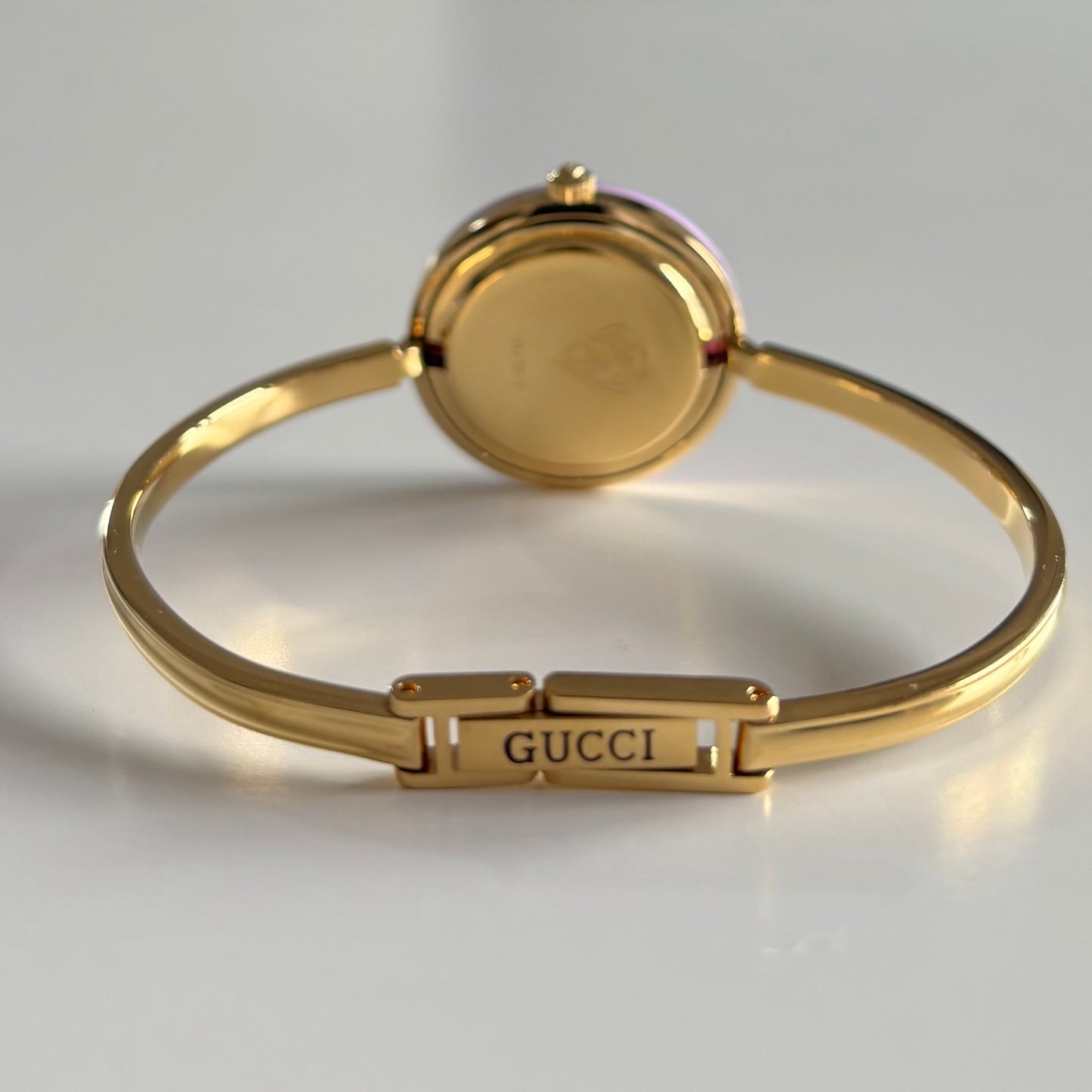 Gucci 1990s Interchangeable Bezel Gold Plated Bangle Watch with 12 bezels, case