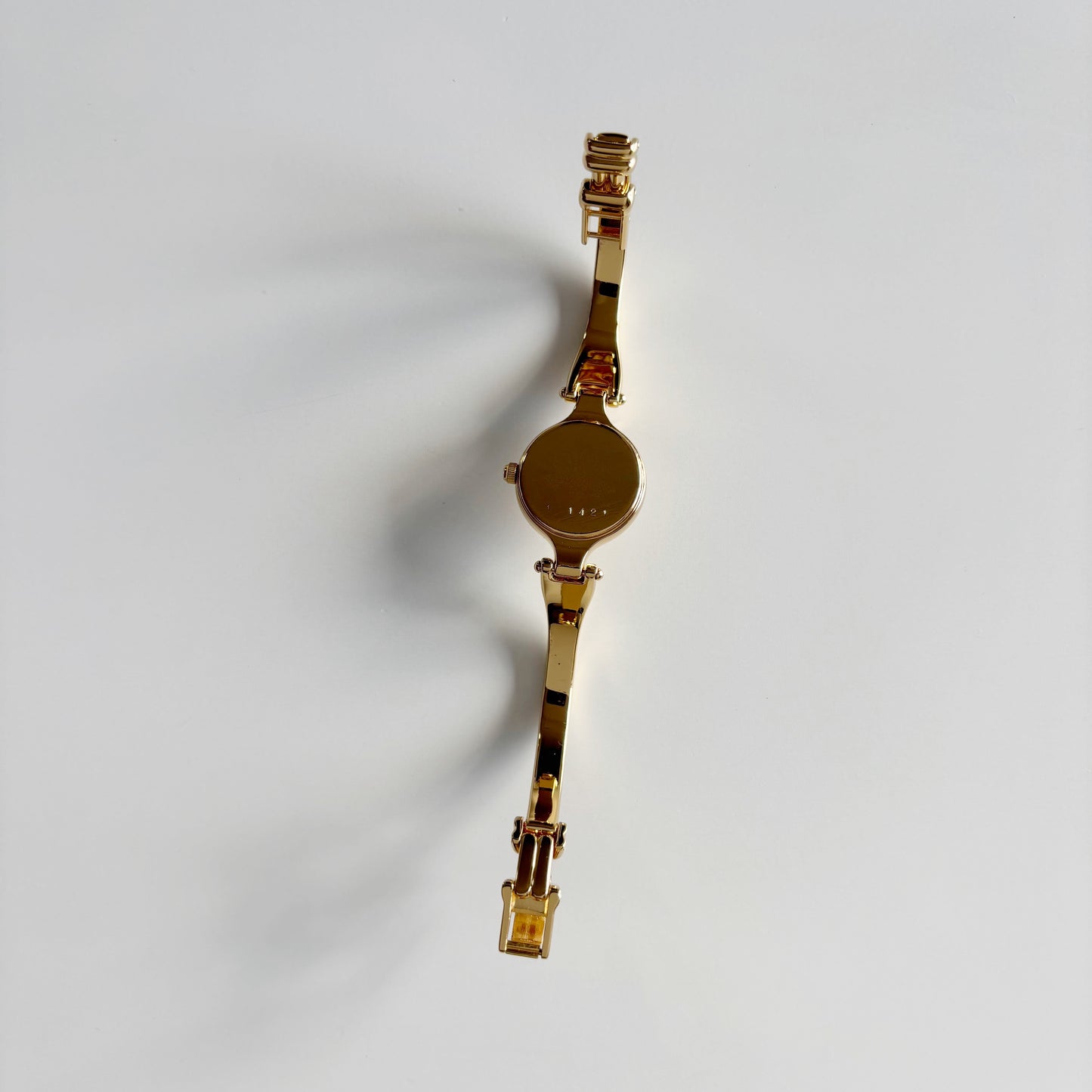 Burberry 1990s Round Dial Gold Plated Bangle Watch