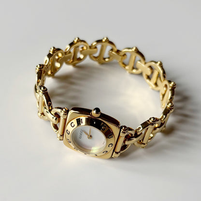 Gucci 1990s Seashell Dial Gold Plated Horsebit Watch