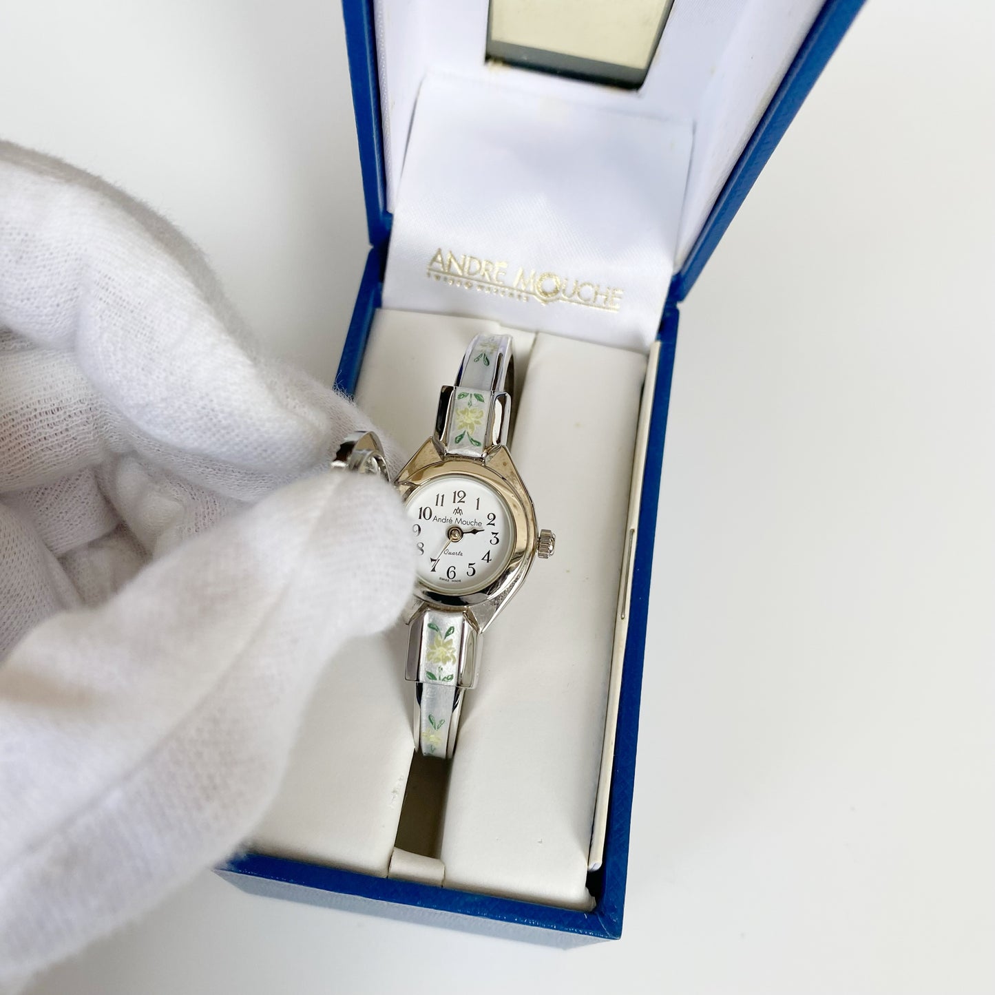 André Mouche Early 2000s Peek-A-Boo Silver Bangle Watch