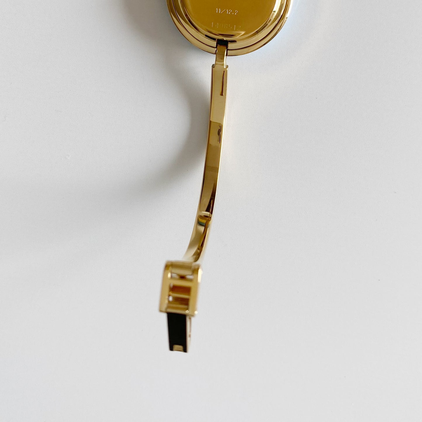 Gucci 1990s Interchangeable Bezel Gold Plated Bangle Watch with 12 bezels, case