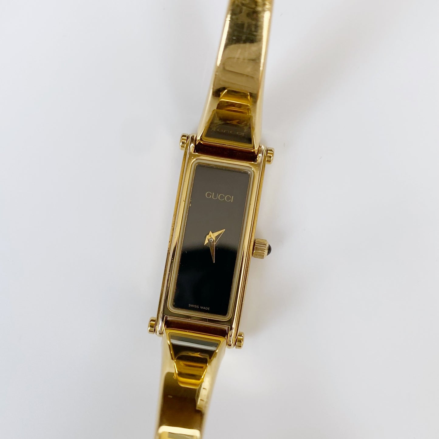 Gucci 1990s Rectangular Black Dial Gold Plated Bangle Watch