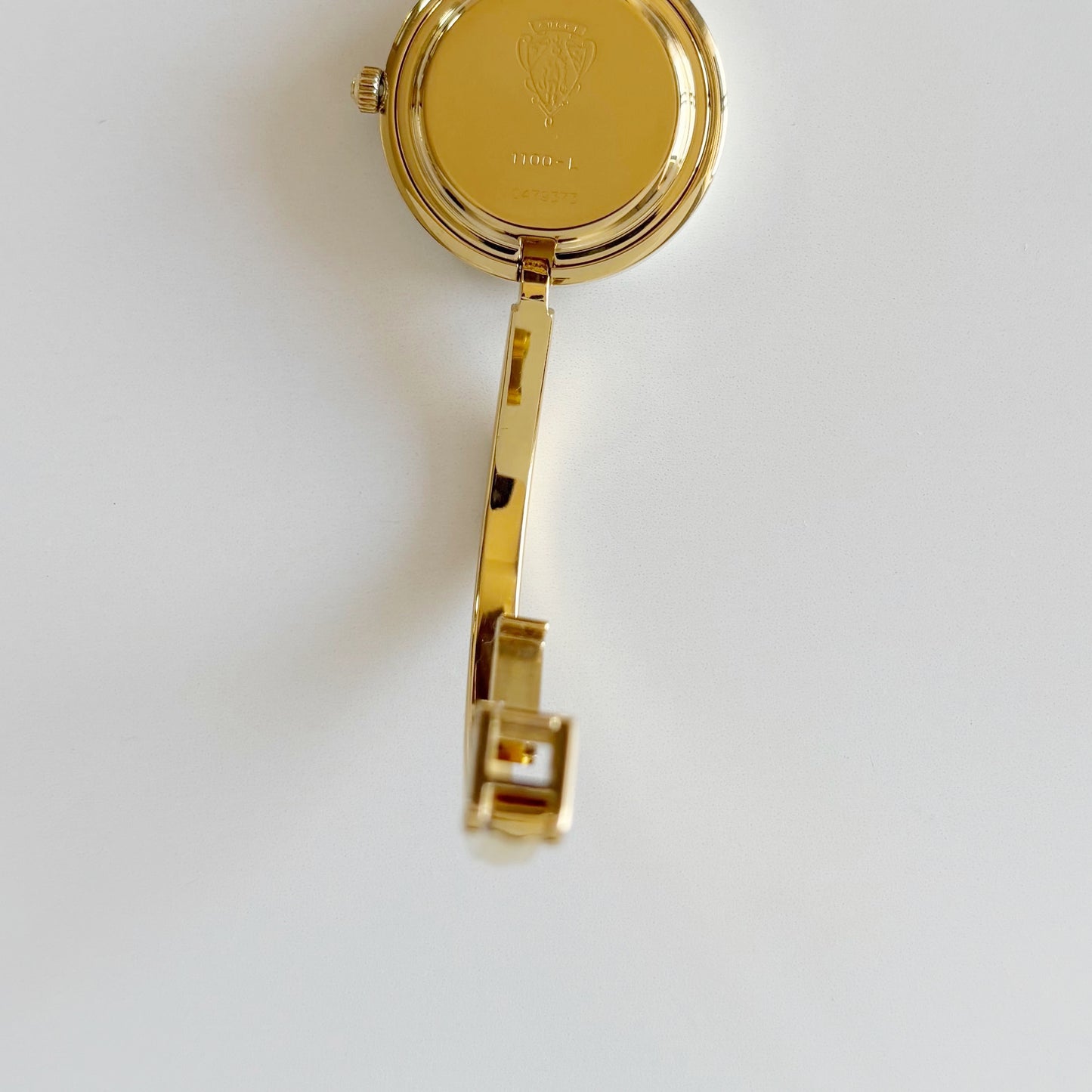 Gucci 1990s Interchangeable Bezel Gold Plated Bangle Watch with 12 bezels, case