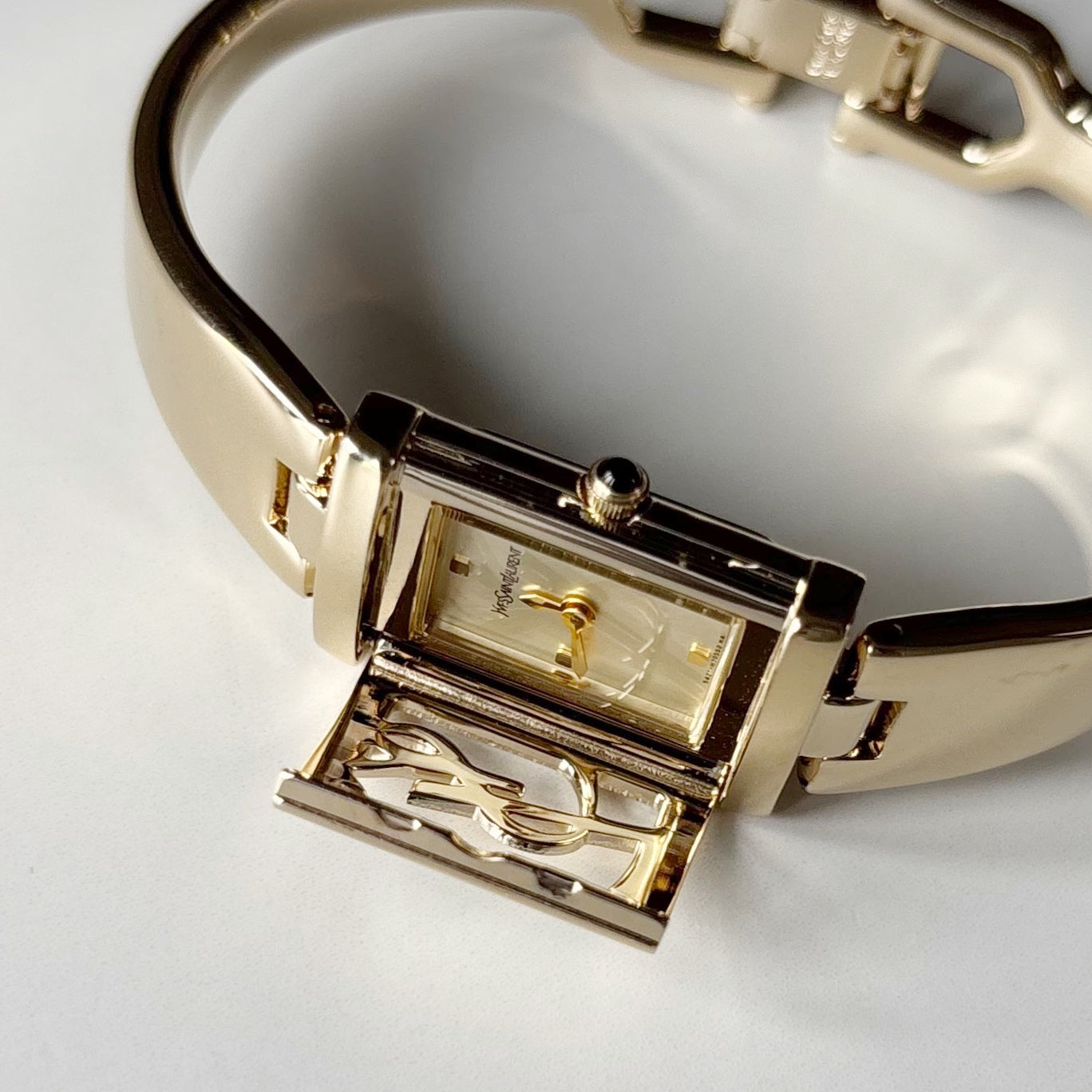 Yves Saint Laurent 1990s Peek-A-Boo Gold Plated Bangle Watch