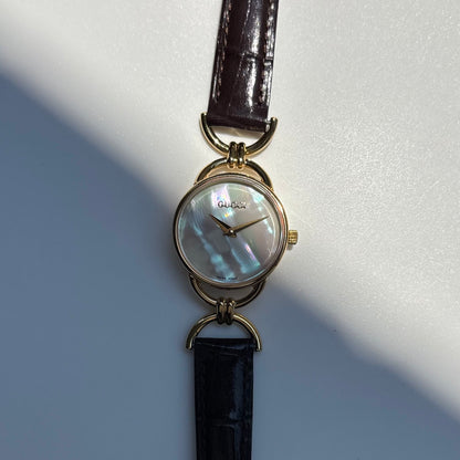 Gucci 1990s Seashell Dial Horsebit Gold Plated Watch