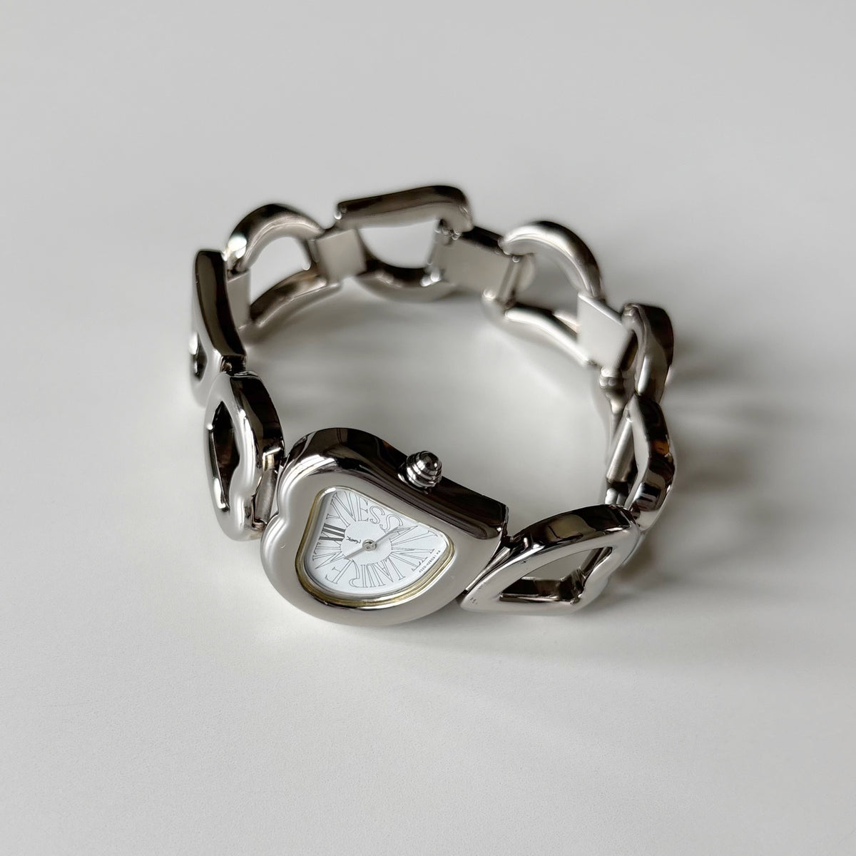 Yves Saint Laurent 1990s Heart Shaped Dial Band Silver Watch