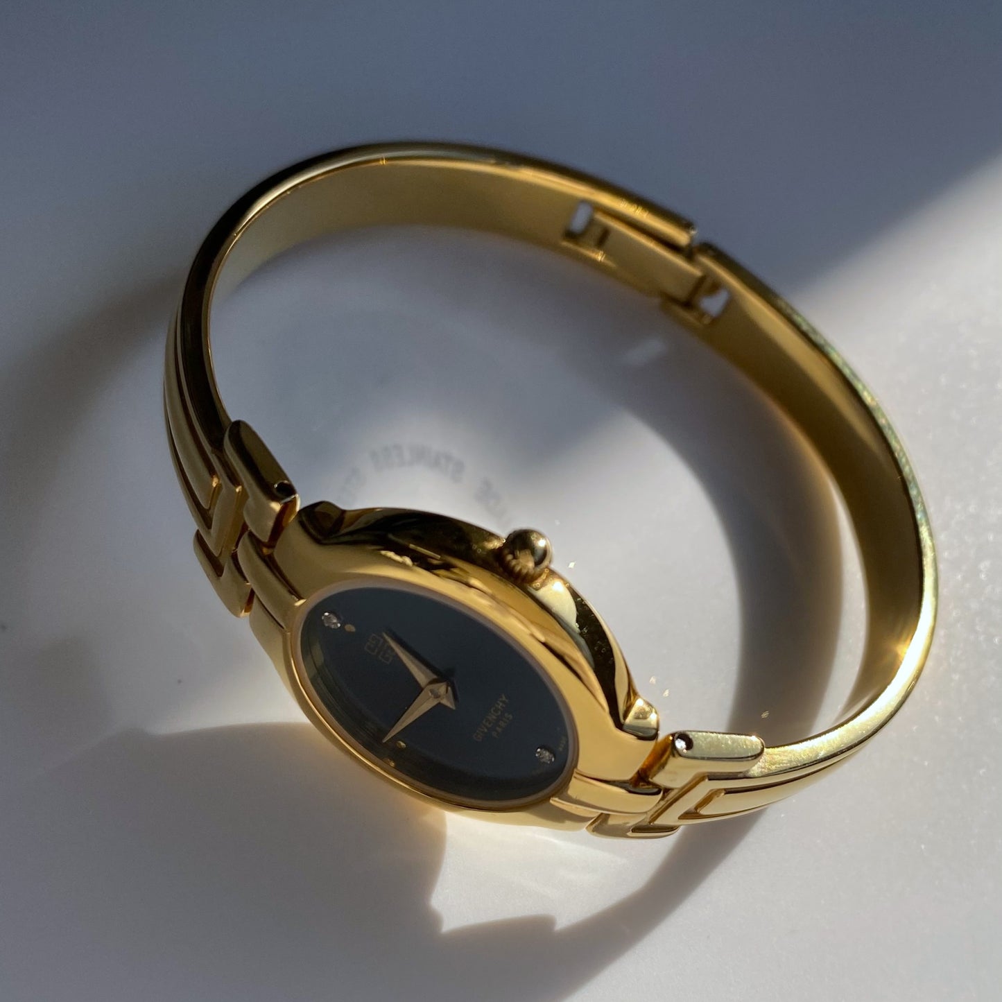 Givenchy 1990s Navy Dial Gold Plated Bangle Watch