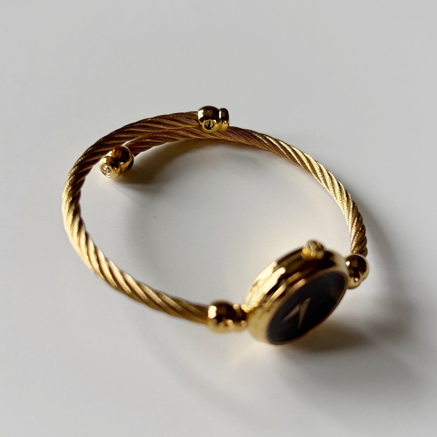 Gucci 1990s Black Dial Gold Plated Cable Bangle Watch