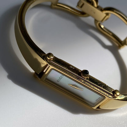 Gucci 1990s Seashell Dial Rectangular Gold Plated Bangle Watch