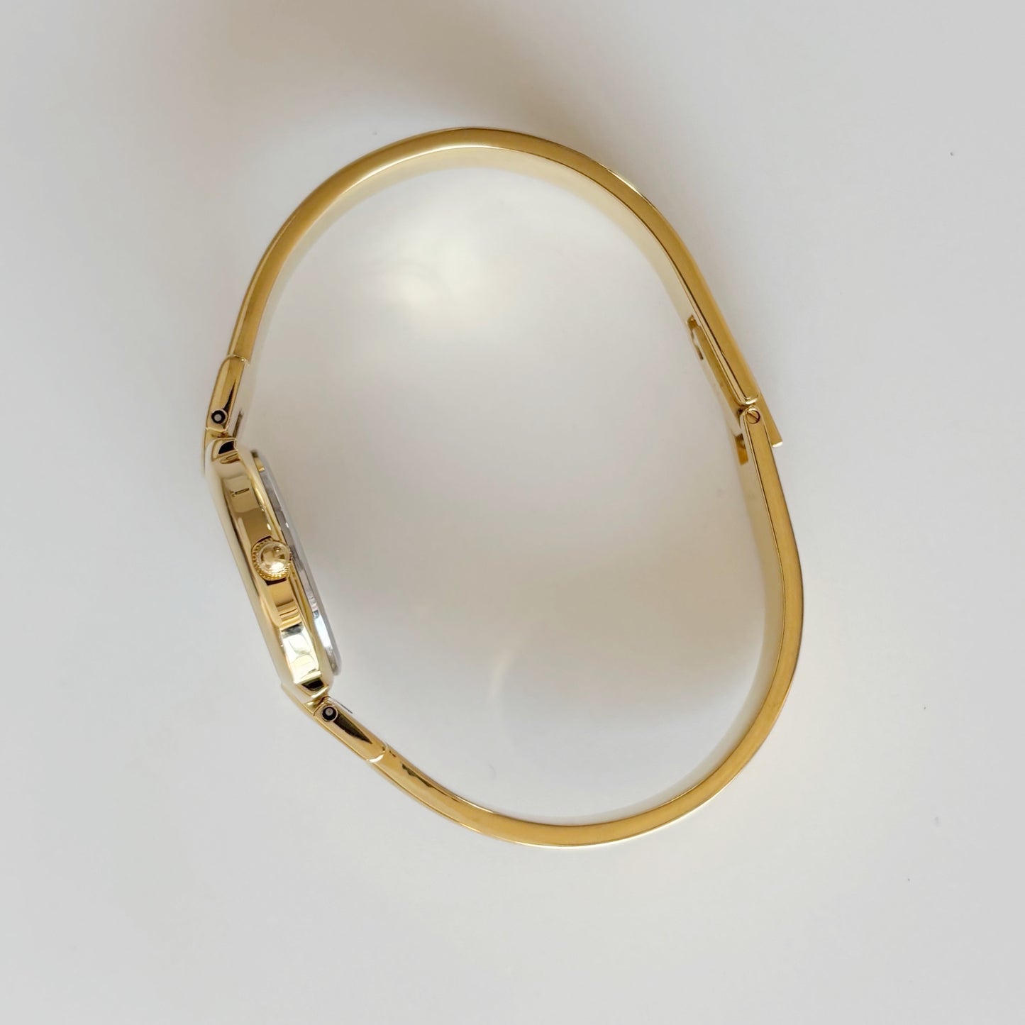 Givenchy 1990s Navy Round Dial Gold Plated Bangle Watch