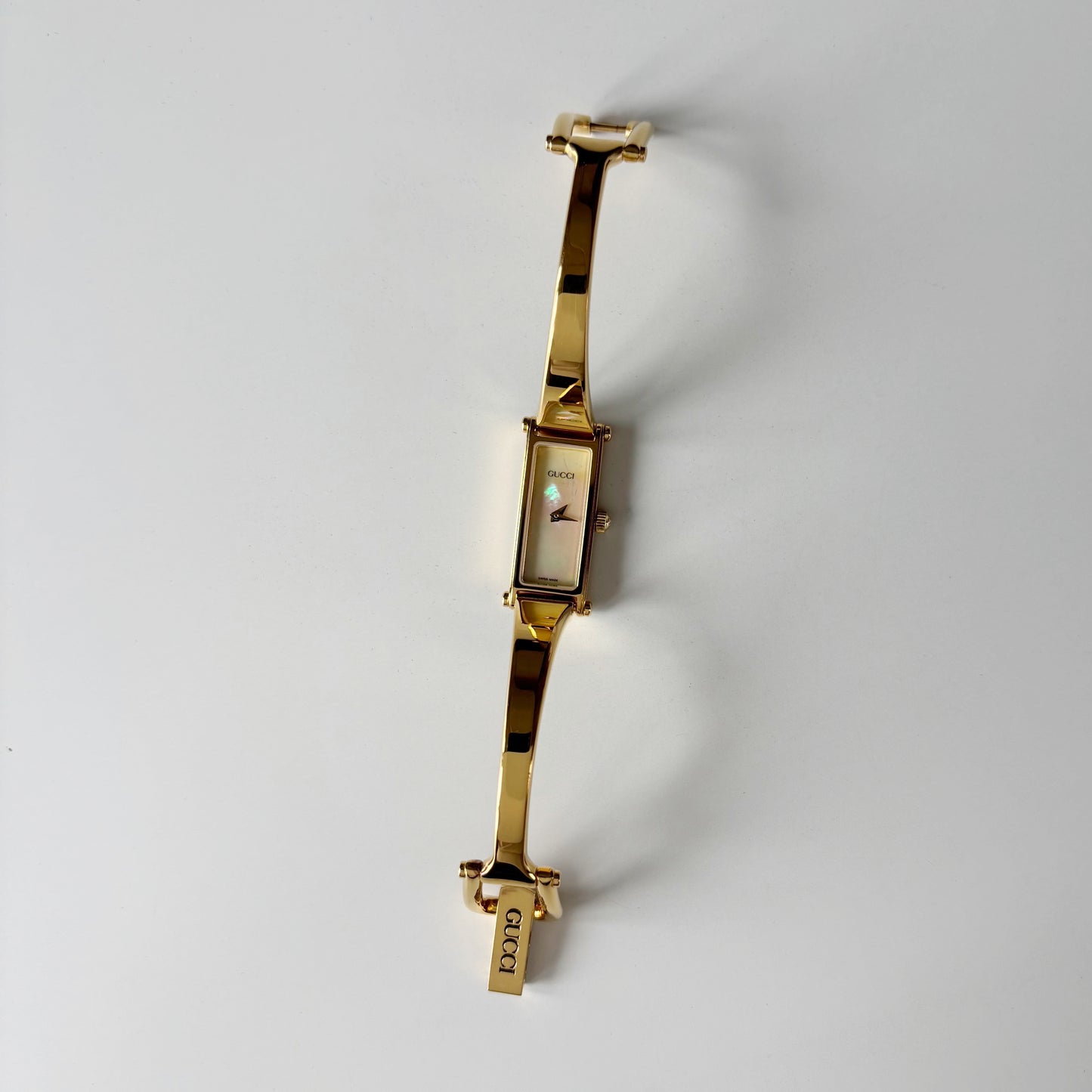 Gucci 1990s Seashell Rectangular Dial Gold Plated Bangle Watch