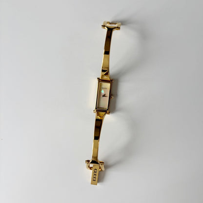 Gucci 1990s Seashell Rectangular Dial Gold Plated Bangle Watch