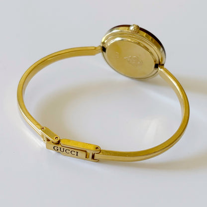 Gucci 1990s Interchangeable Bezel Gold Plated Bangle Watch with 1 bezel