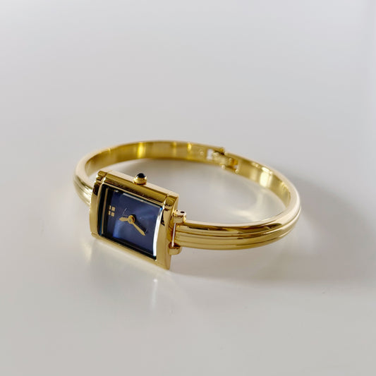 Yves Saint Laurent 1990s Gold Plated Bangle Watch