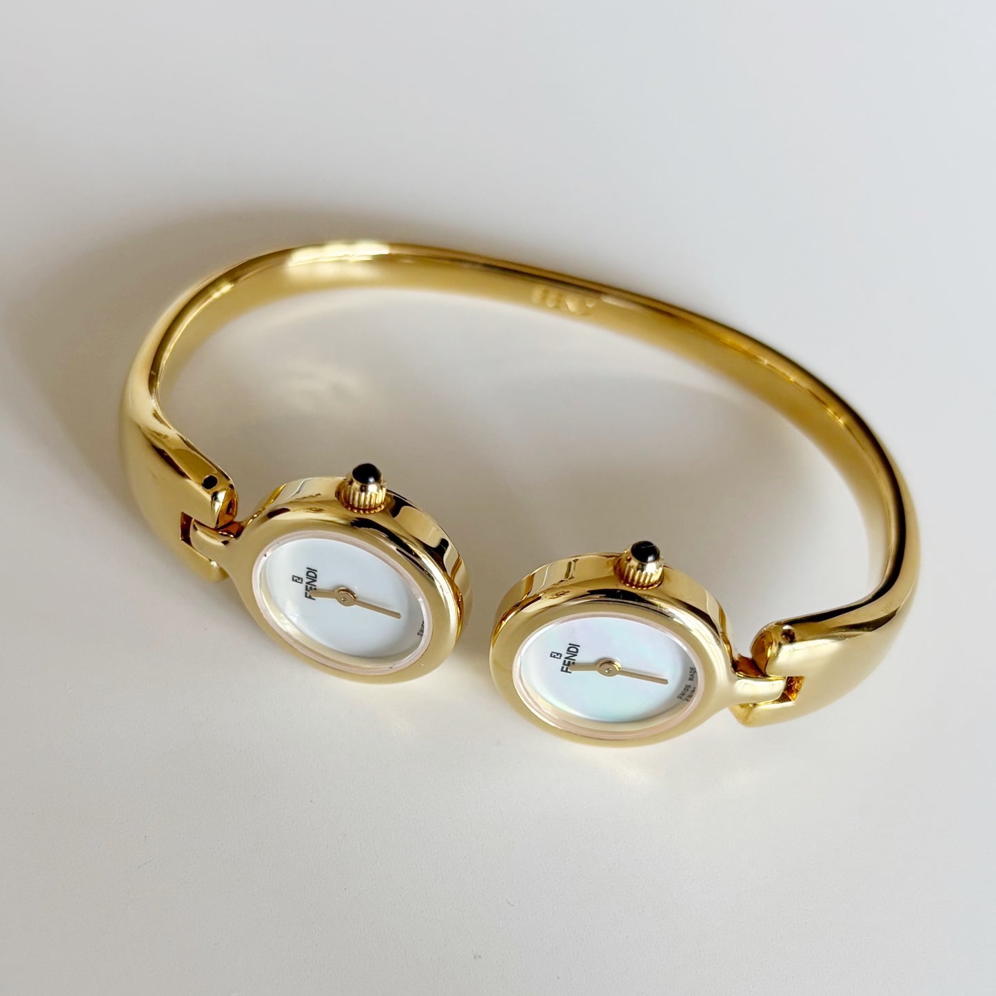 Fendi 1990s Seashell Dial Two Time Zone Gold Plated Bangle Watch