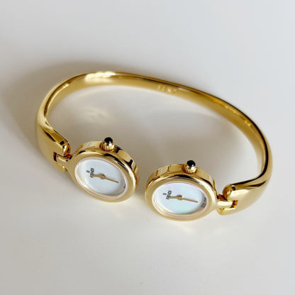 Fendi 1990s Seashell Dial Two Time Zone Gold Plated Bangle Watch