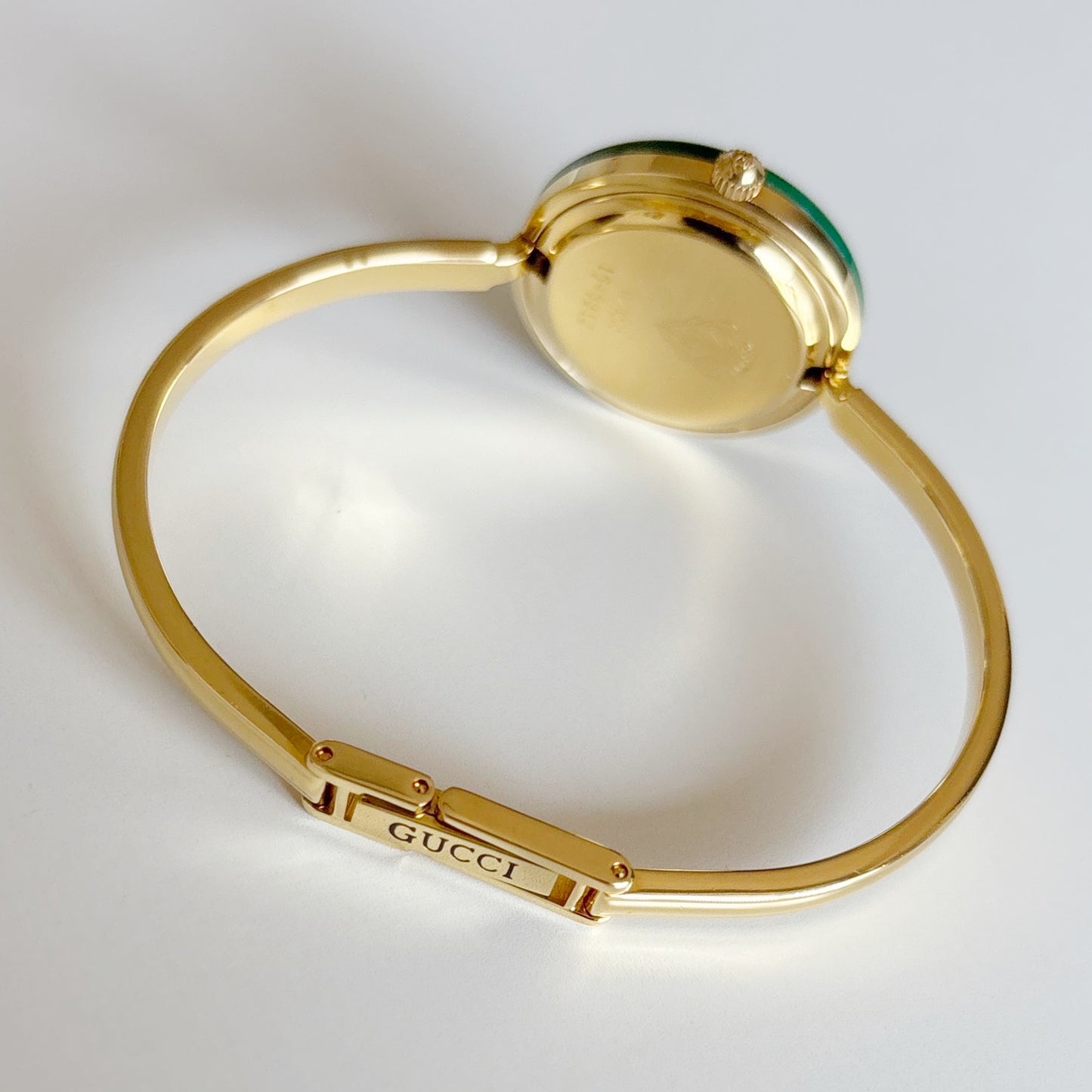 Gucci 1990s Interchangeable Bezel Gold Plated Bangle Watch with 12 bezels, case