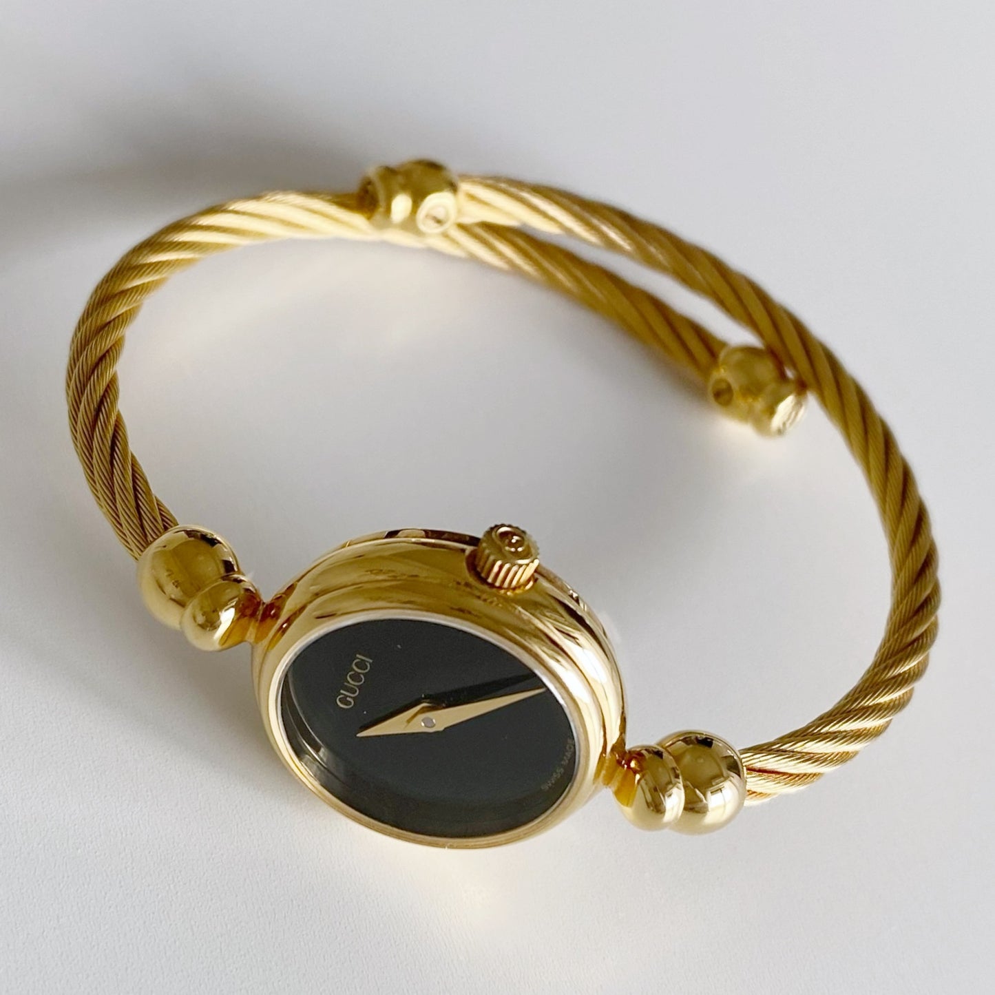 Gucci 1990s Black Dial Gold Plated Bangle Watch