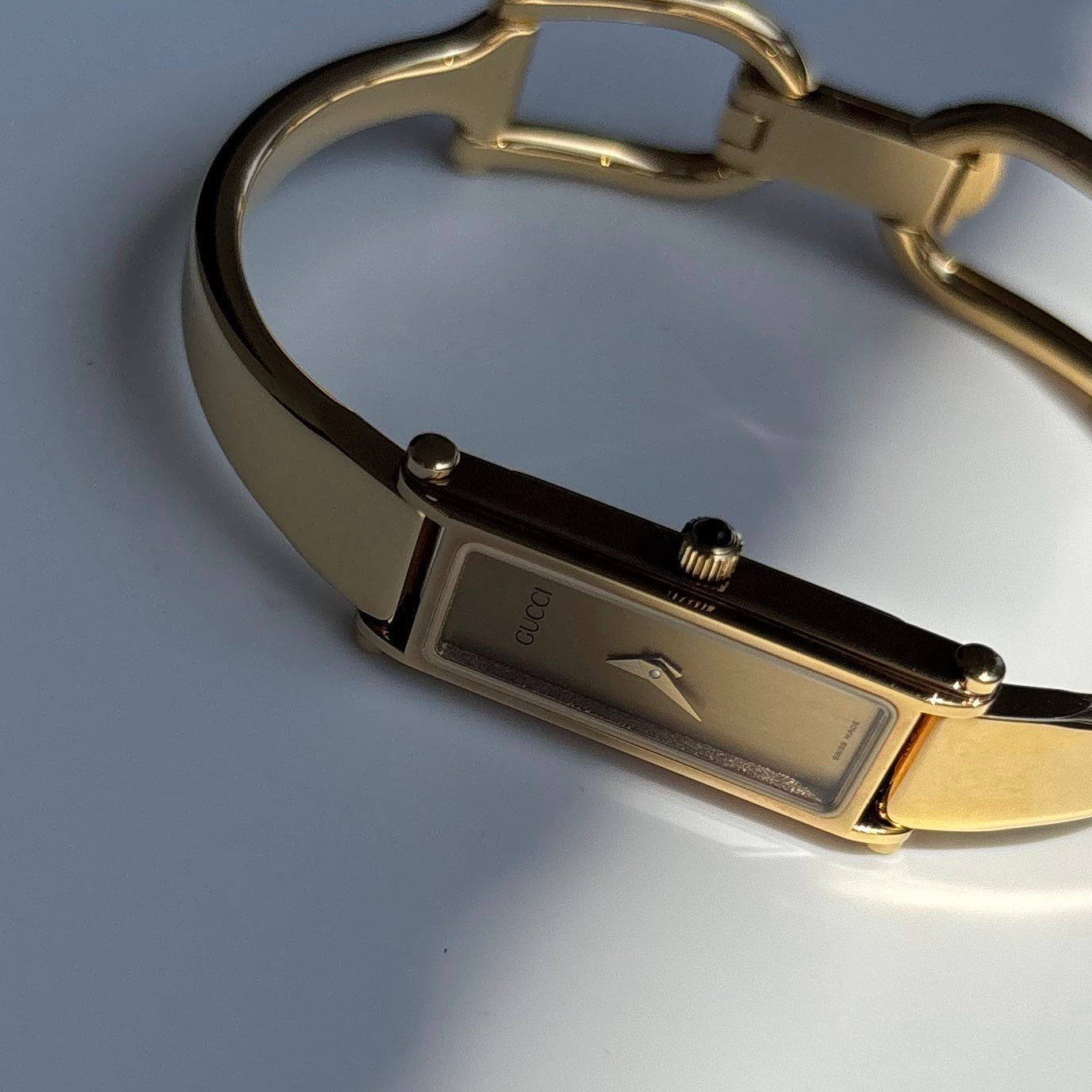 Gucci 1990s Gold Rectangular Dial Gold Plated Bangle Watch