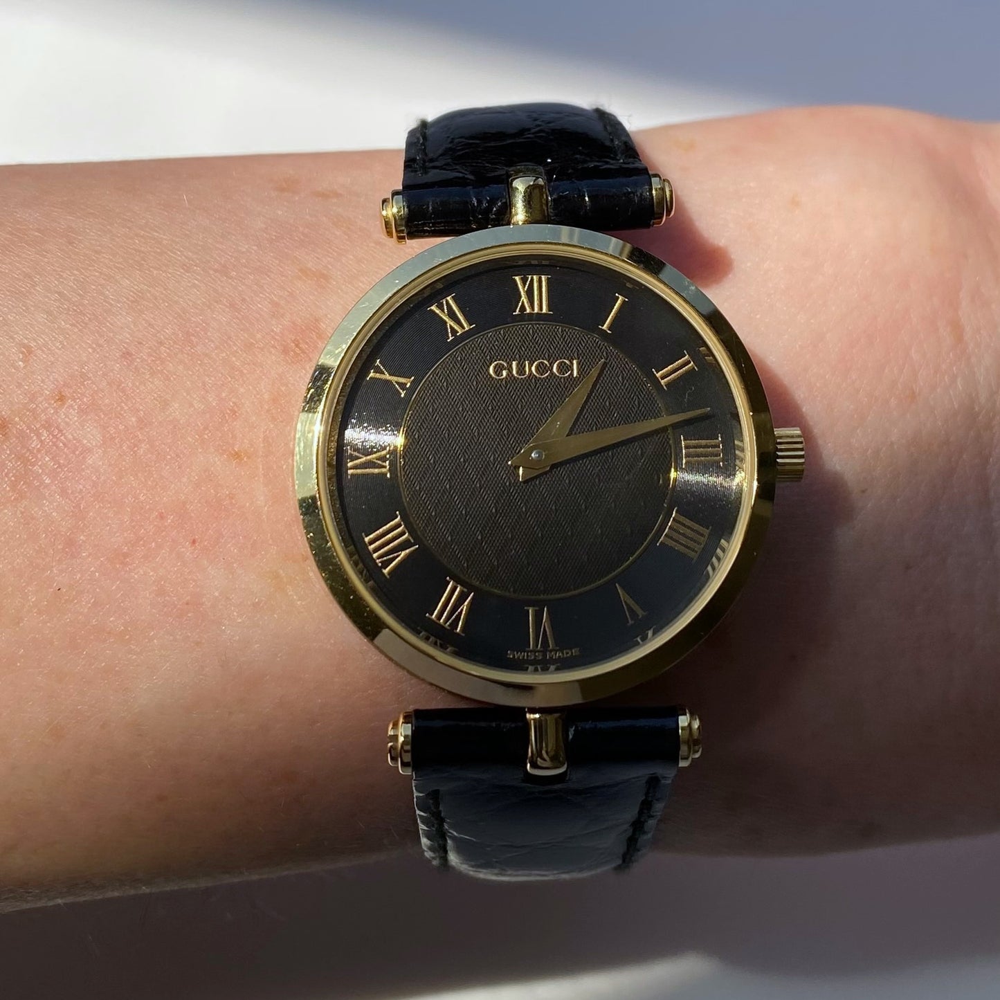 Gucci 1990s Black Dial Gold Plated Black Leather Watch