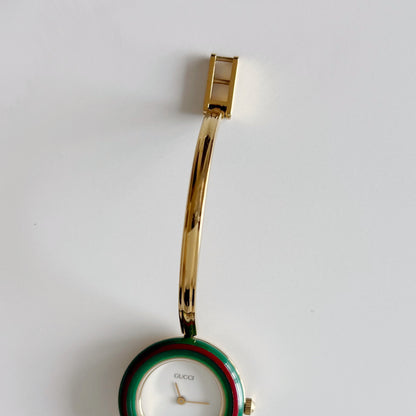 Gucci 1990s Interchangeable Bezel Gold Plated Bangle Watch with 12 bezels, case
