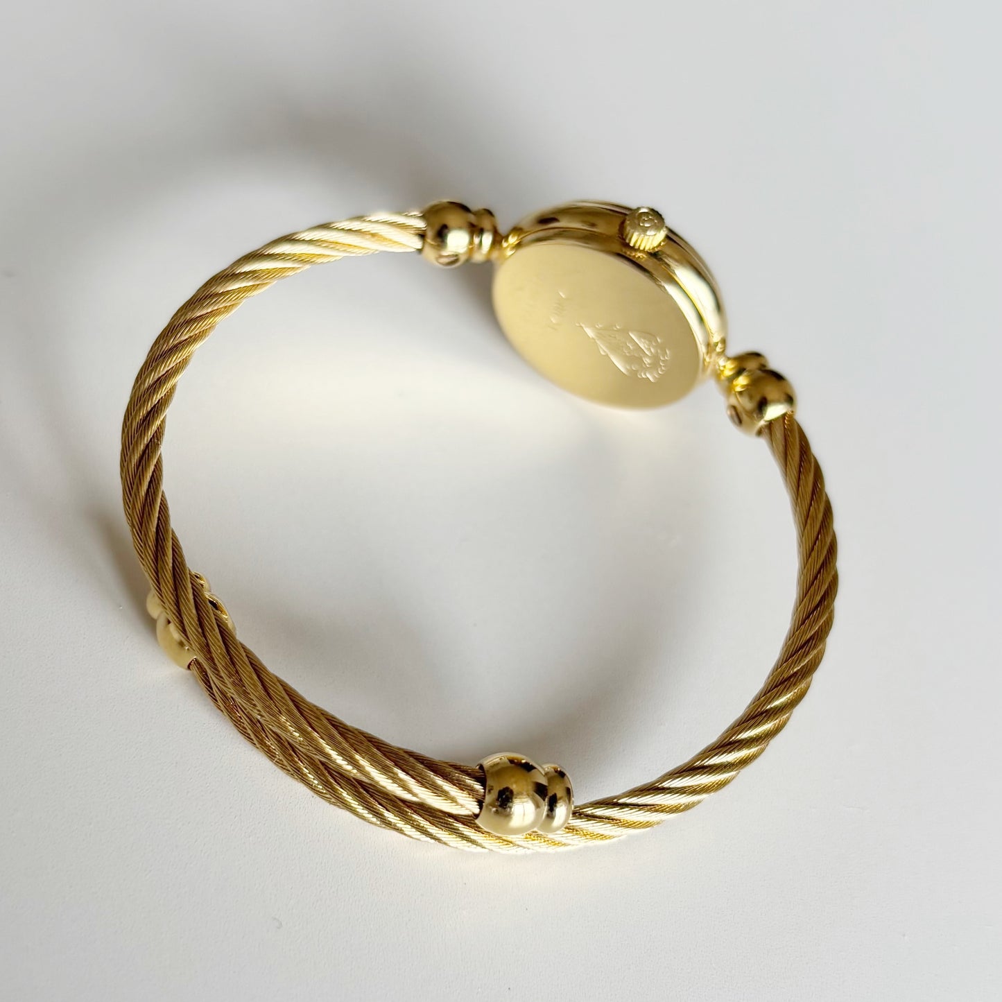 Gucci 1990s Seashell Dial Gold Plated Cable Bangle Watch