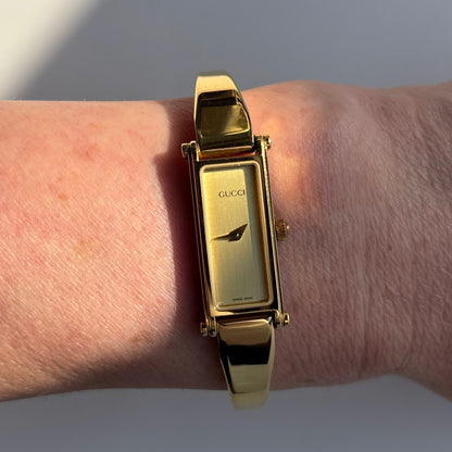 Gucci 1990s Gold Dial Rectangular Gold Plated Bangle Watch