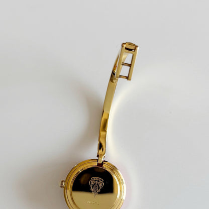Gucci 1990s Interchangeable Bezel Gold Plated Bangle Watch with 12 bezels, case