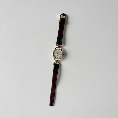 Gucci 1980s Cream Round Dial Horsebit Gold-Plated Watch
