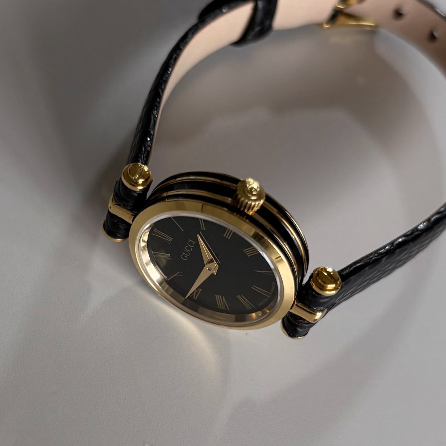 Gucci 1990s Black Round Dial Gold Plated Watch