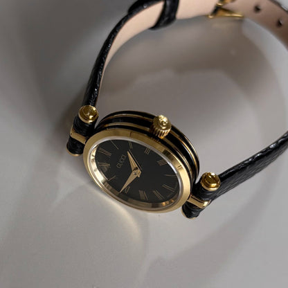 Gucci 1990s Black Round Dial Gold Plated Watch