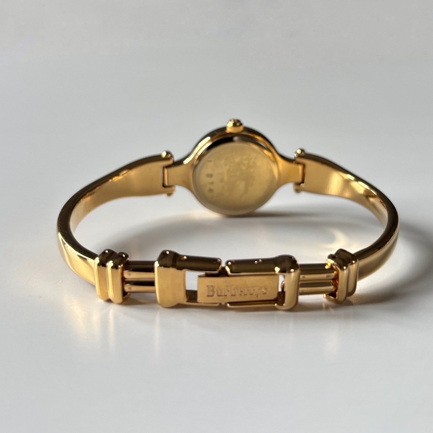 Burberry 1990s Round Dial Gold Plated Bangle Watch