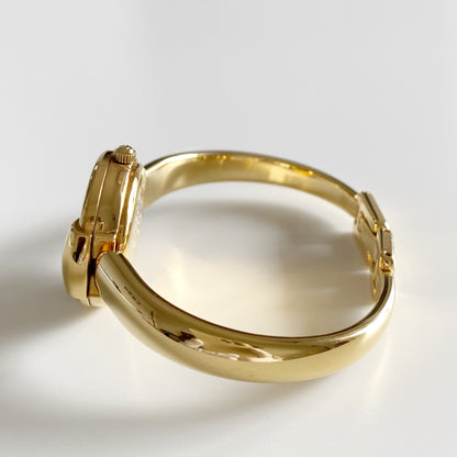 Gucci 1990s Round Dial Gold Plated Bangle Watch