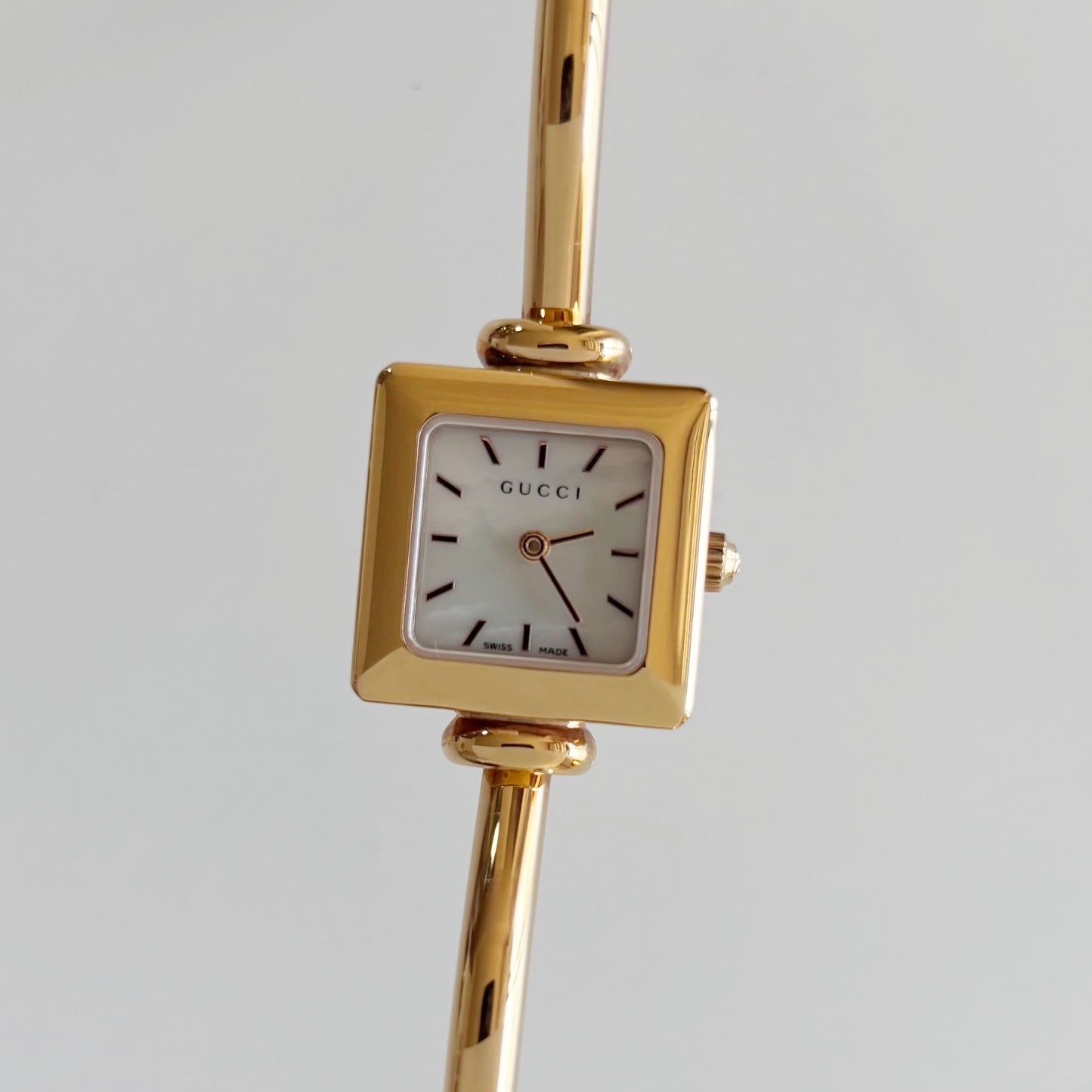 Gucci 1990s Seashell Square Dial Gold Plated Bangle Watch
