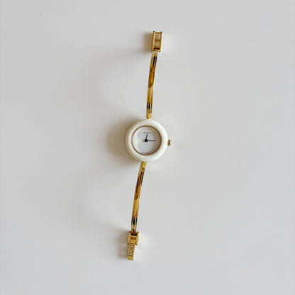 Gucci 1990s Interchangeable Bezel Gold Plated Bangle Watch with 12 bezels, case (Small)