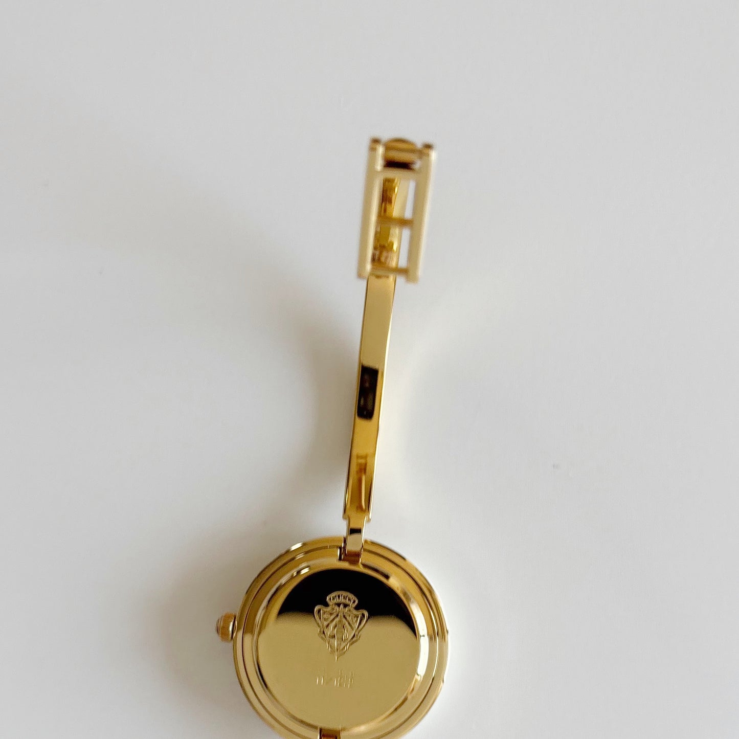 Gucci 1990s Interchangeable Bezel Gold Plated Bangle Watch with 12 bezels, case