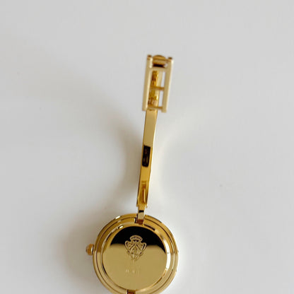 Gucci 1990s Interchangeable Bezel Gold Plated Bangle Watch with 12 bezels, case