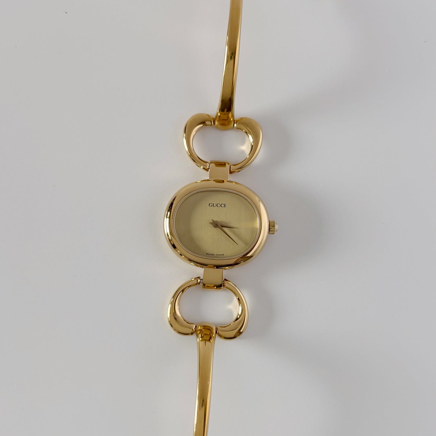 Gucci 1990s Oval Dial Gold Plated Bangle Watch